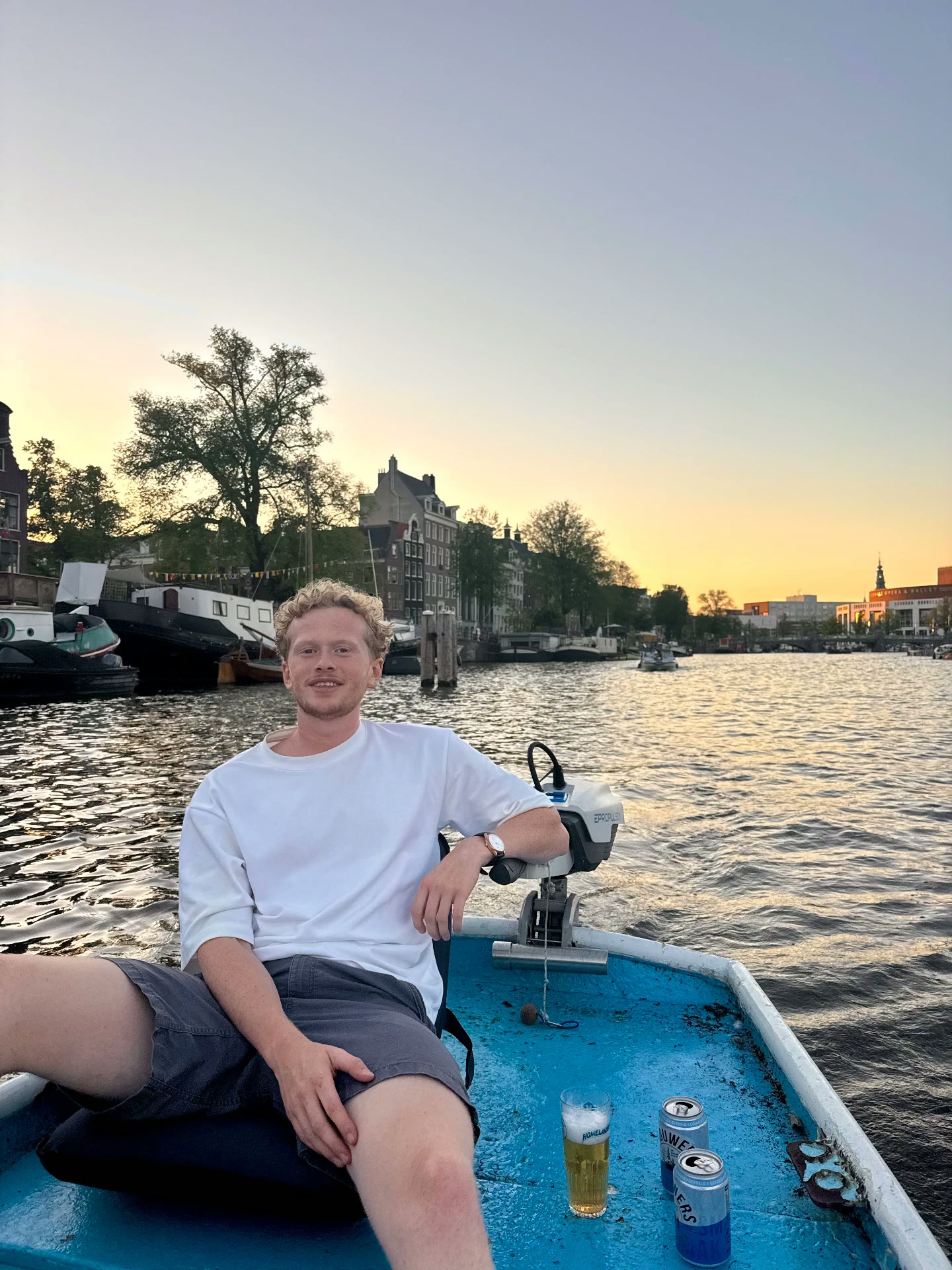 Evening on the water, city lights starting to come on